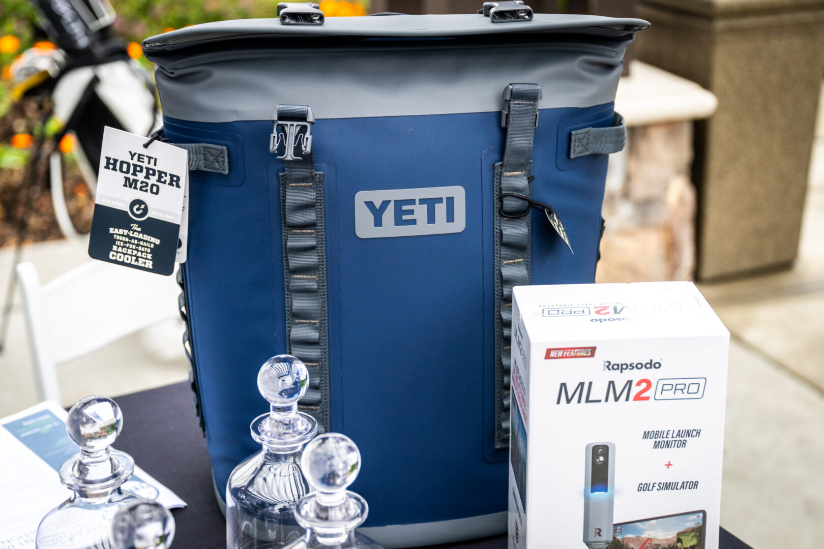 YETI Hopper M20 cooler displayed with accessories.
