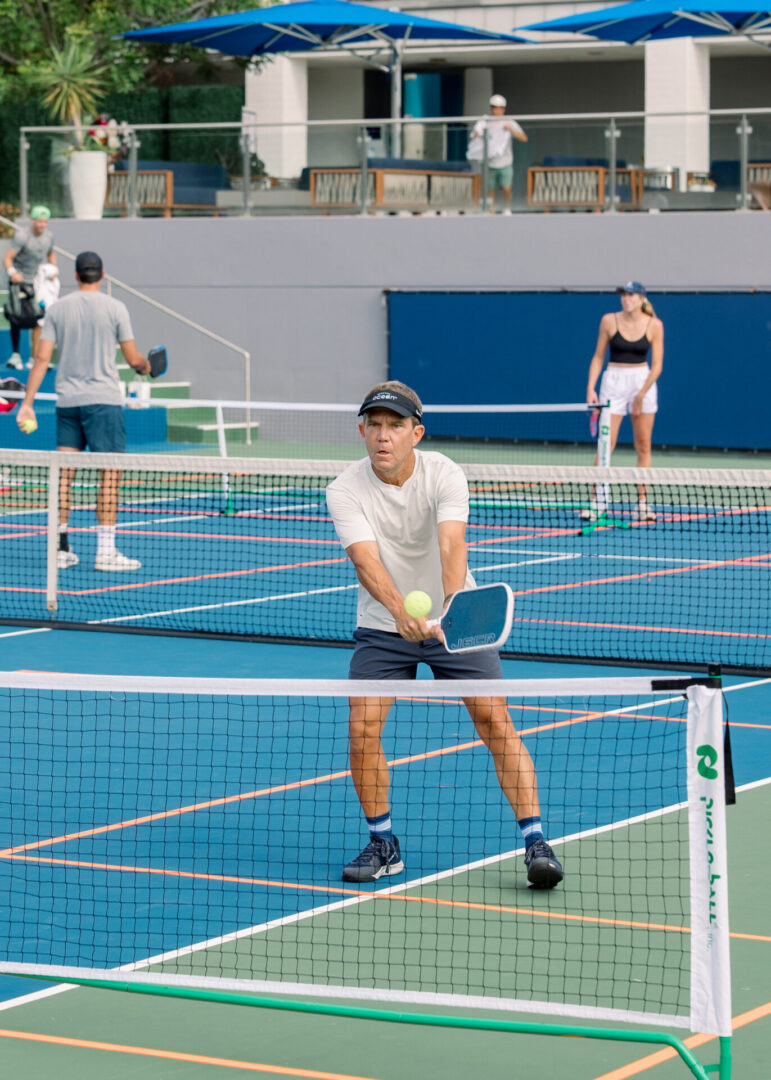 Player preparing to hit a pickleball