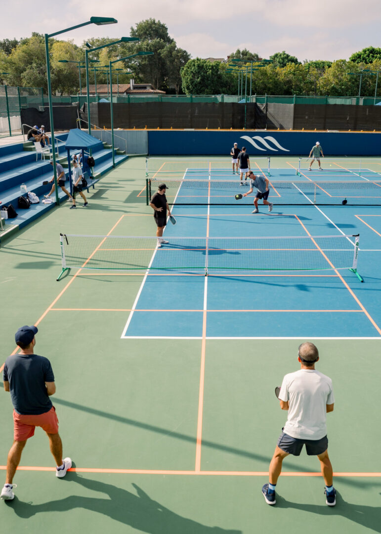 Overview of multiple pickleball courts in use